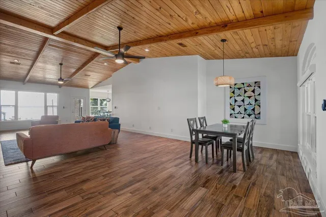 a kitchen with cabinets and window