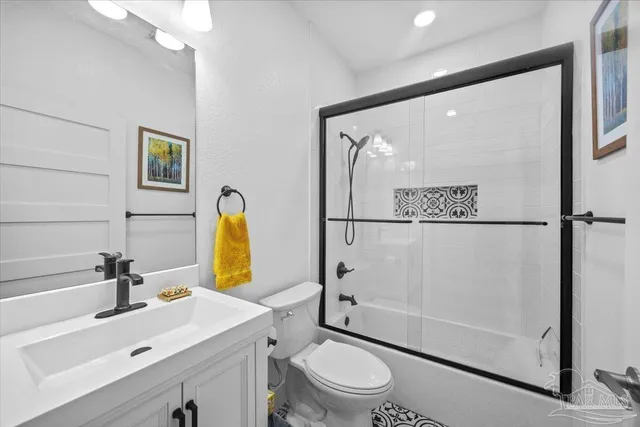 a bathroom with a sink and a shower