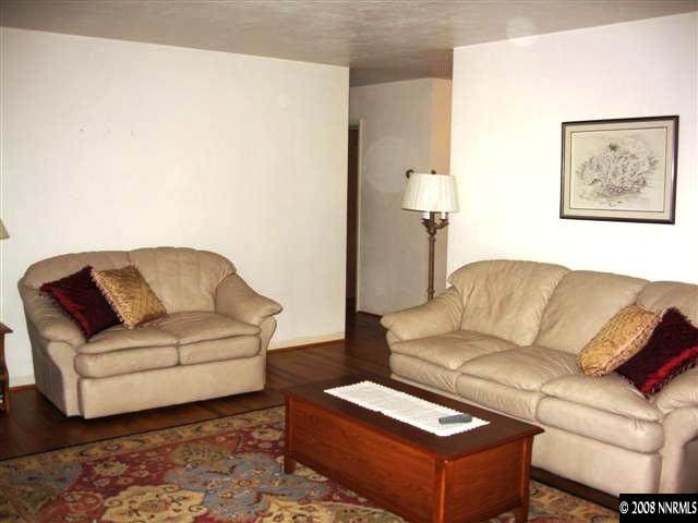 1965 Wren Street Reno, NV 89509 - Photo 2 of 9 a living room with furniture and a couch