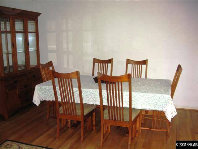 1965 Wren Street Reno, NV 89509 - Photo 5 of 9 a view of a dining room with furniture and wooden floor