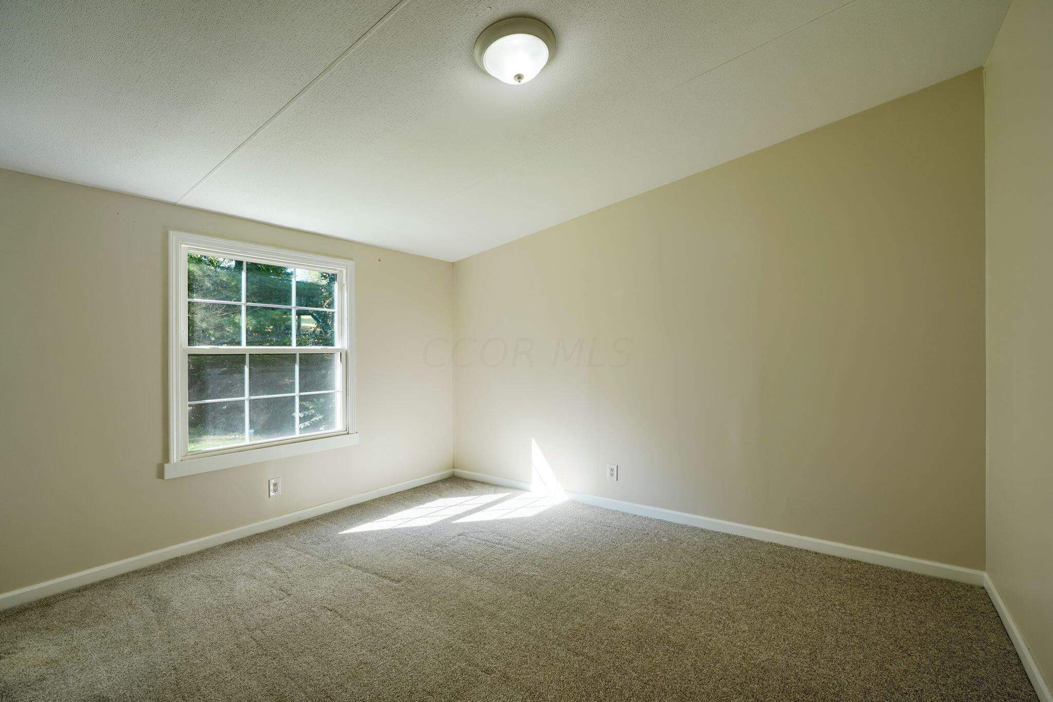 331 Massie Road Oak Hill, OH 45656 - Photo 15 of 29 15. Primary Bedroom