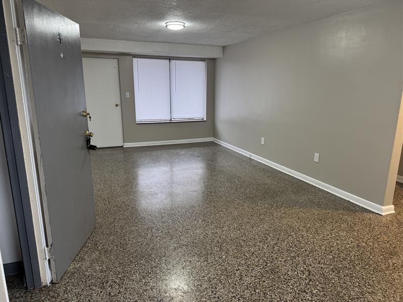 100 Ridgeview Lane, Unit 4 Bassett, VA 24055 - Photo 7 of 7 an empty room with wooden floor and windows