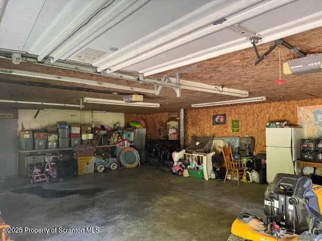 a view of a house with a yard deck and sitting area