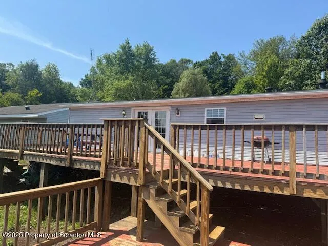 a view of balcony with furniture