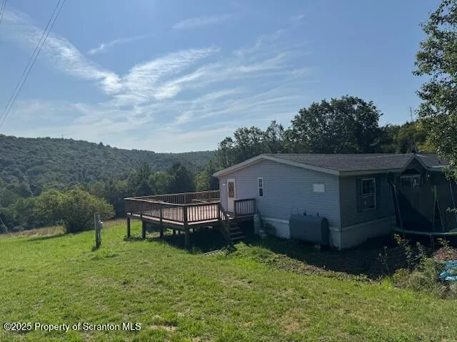 a house view with a garden space