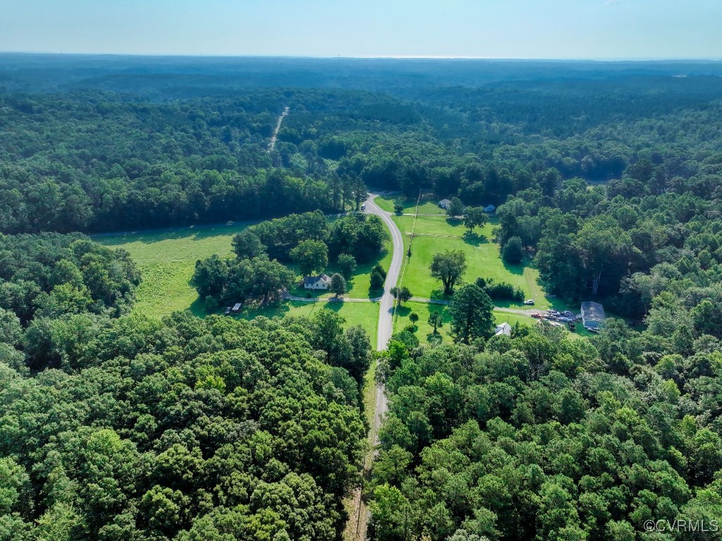 0 Black Stump Road Weems, VA 22576 - Photo 5 of 25 an aerial view of residential house with outdoor space and trees all around