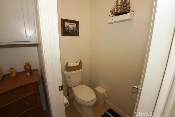a bathroom with a toilet and a sink