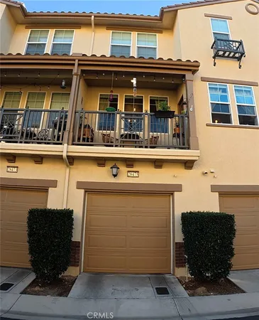 a view of a building with sitting area