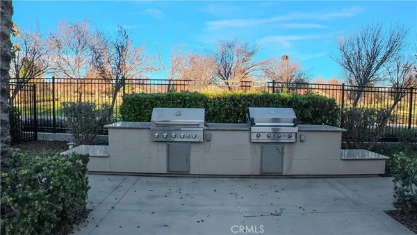 a view of a backyard with sitting area