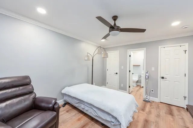 a bedroom with a bed and furniture