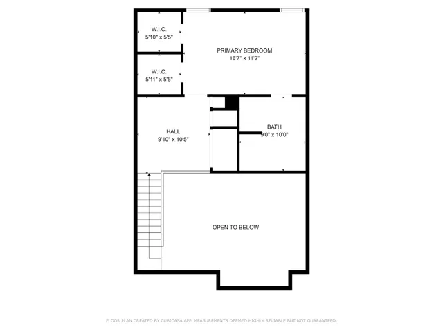 a view of a room that has a large window