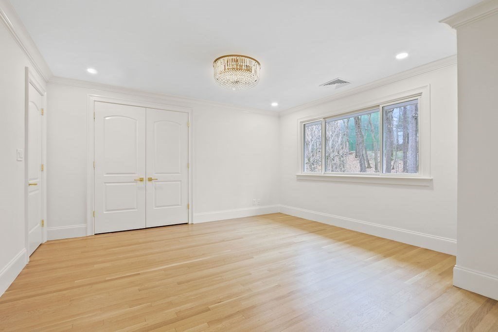 80 Doublet Hill Road Weston, MA 02493 - Photo 31 of 38 a view of an empty room with a window