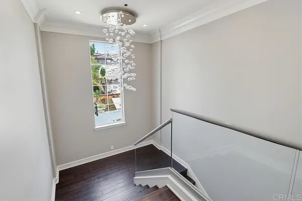 a room with window and wooden floor
