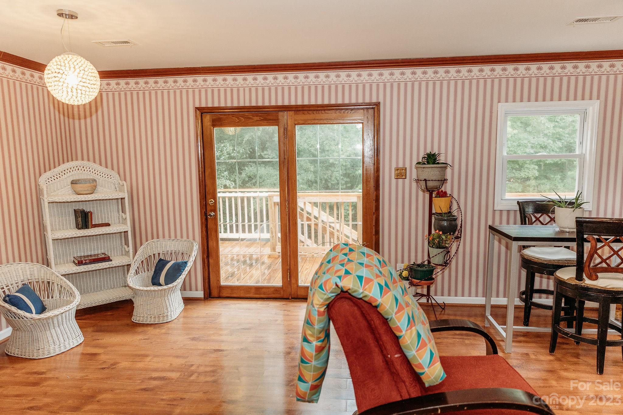 8808 Webb Road Stanfield, NC 28163 - Photo 18 of 33 a living room filled with furniture and a large window