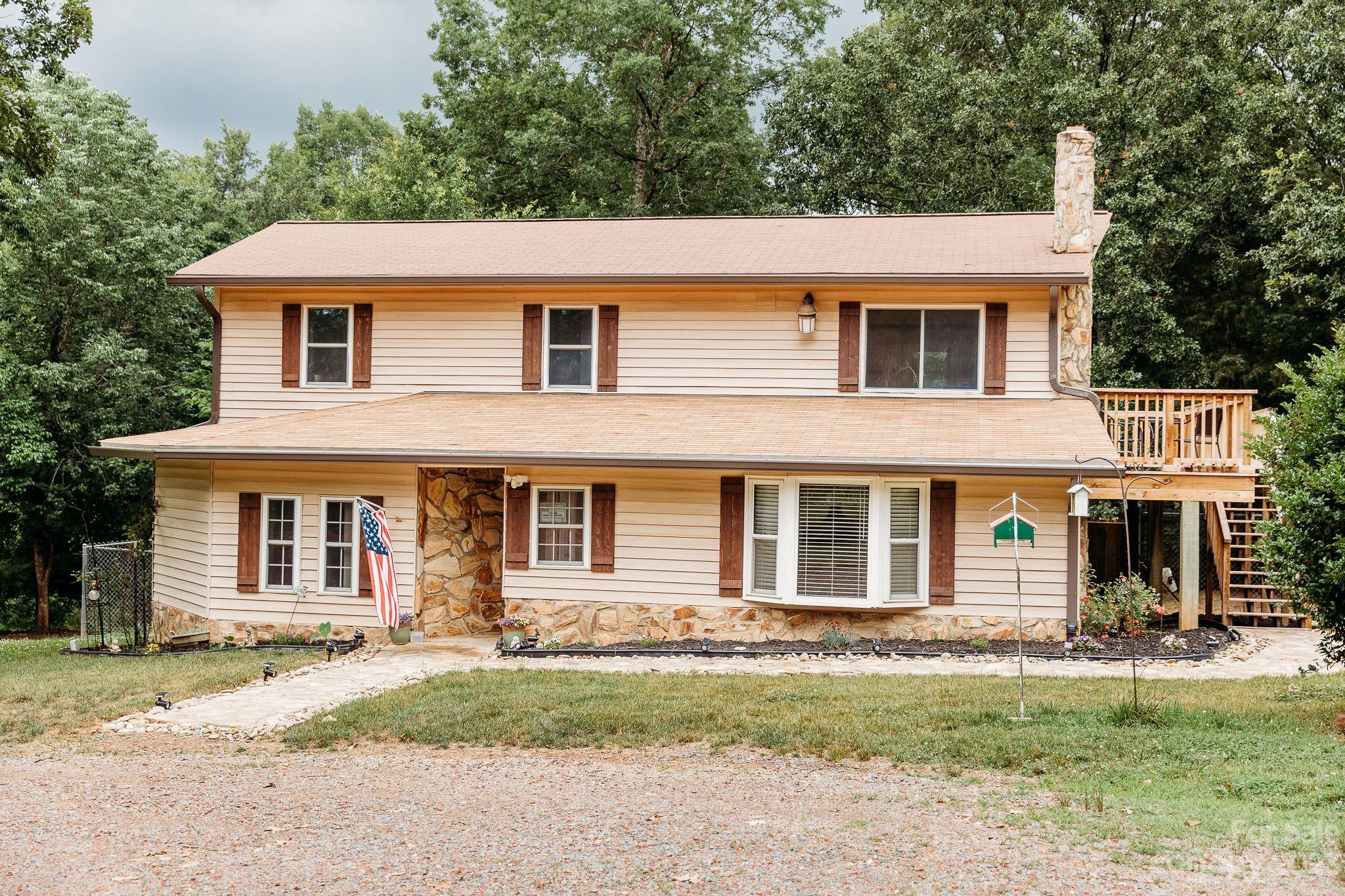 8808 Webb Road Stanfield, NC 28163 - Photo 2 of 33 a view of a yard in front of a house