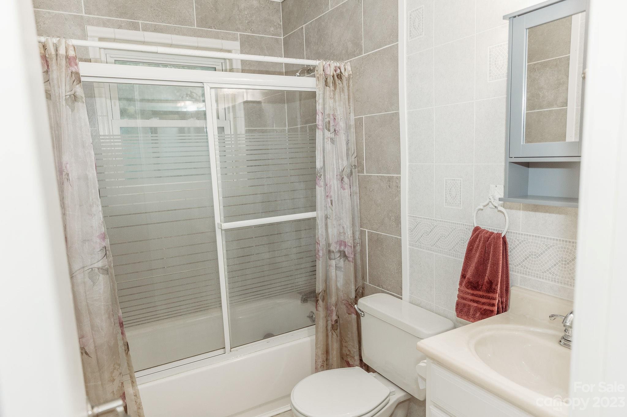 8808 Webb Road Stanfield, NC 28163 - Photo 25 of 33 a bathroom with a toilet and a shower