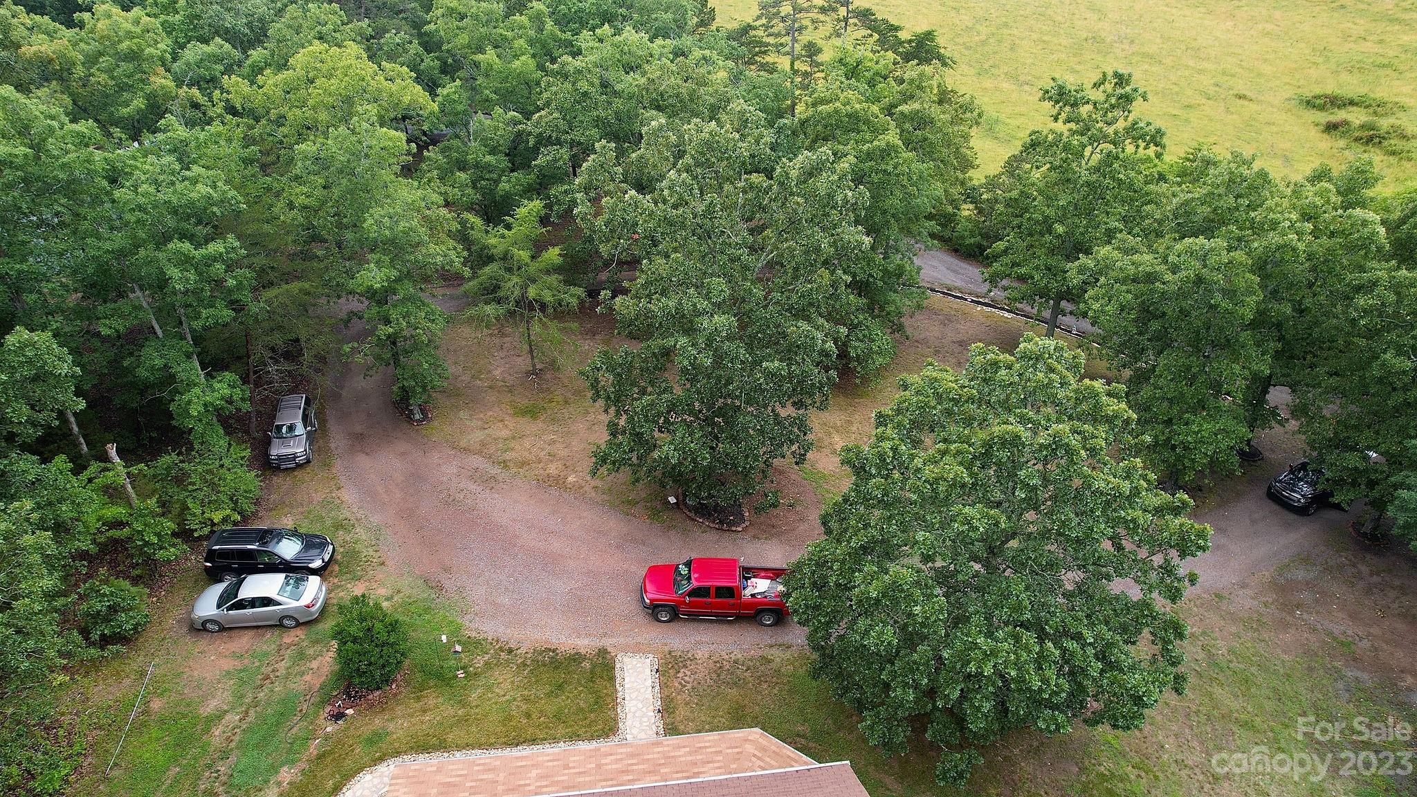 8808 Webb Road Stanfield, NC 28163 - Photo 30 of 33 an aerial view of a house with a yard