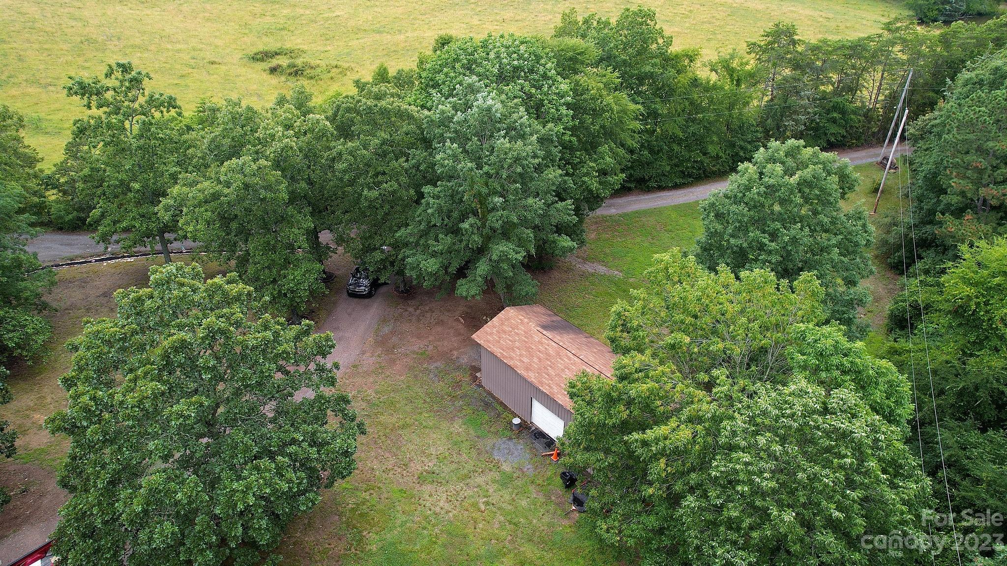 8808 Webb Road Stanfield, NC 28163 - Photo 31 of 33 an aerial view of a house with a yard