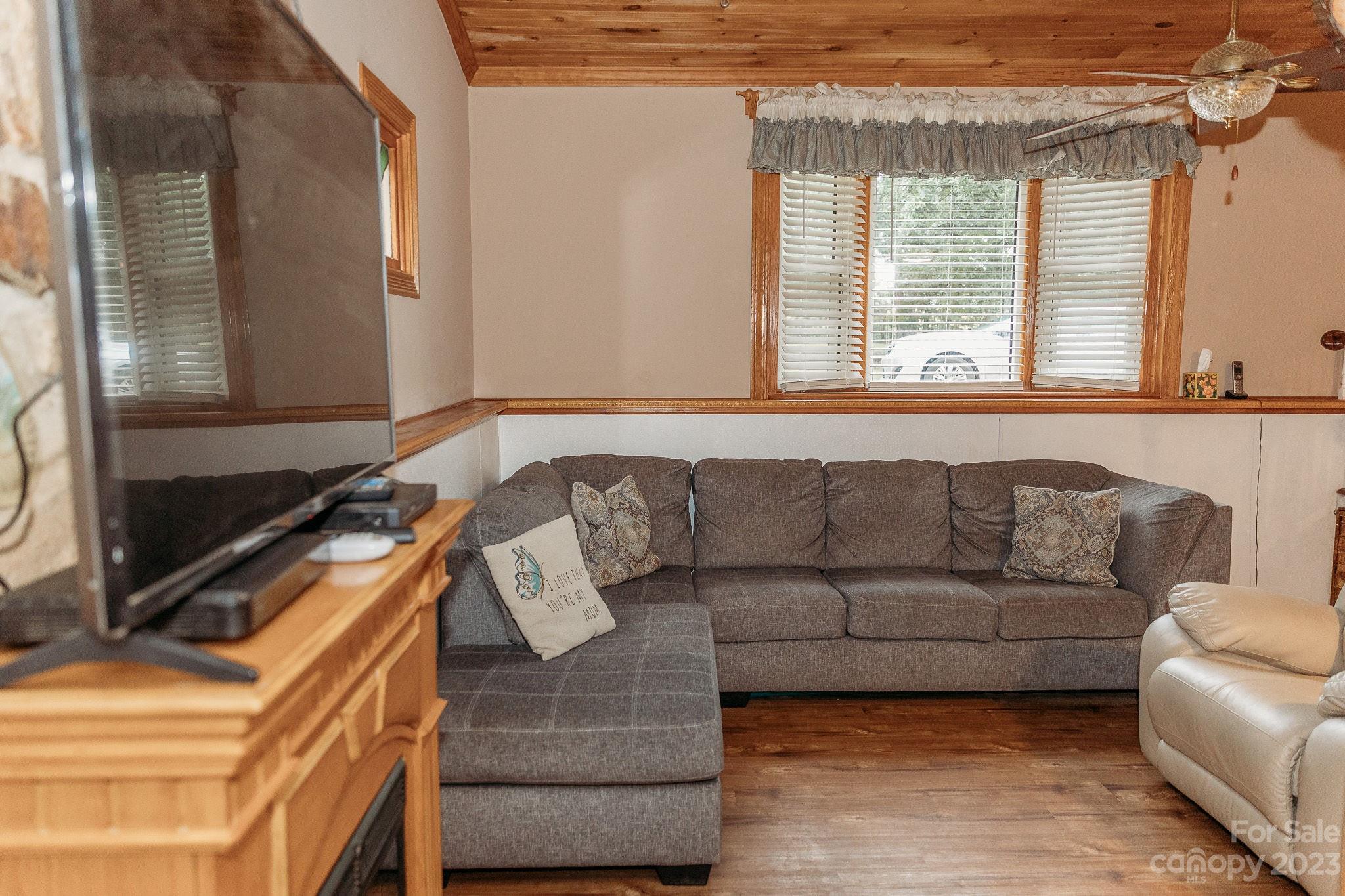 8808 Webb Road Stanfield, NC 28163 - Photo 4 of 33 a living room with furniture and a window