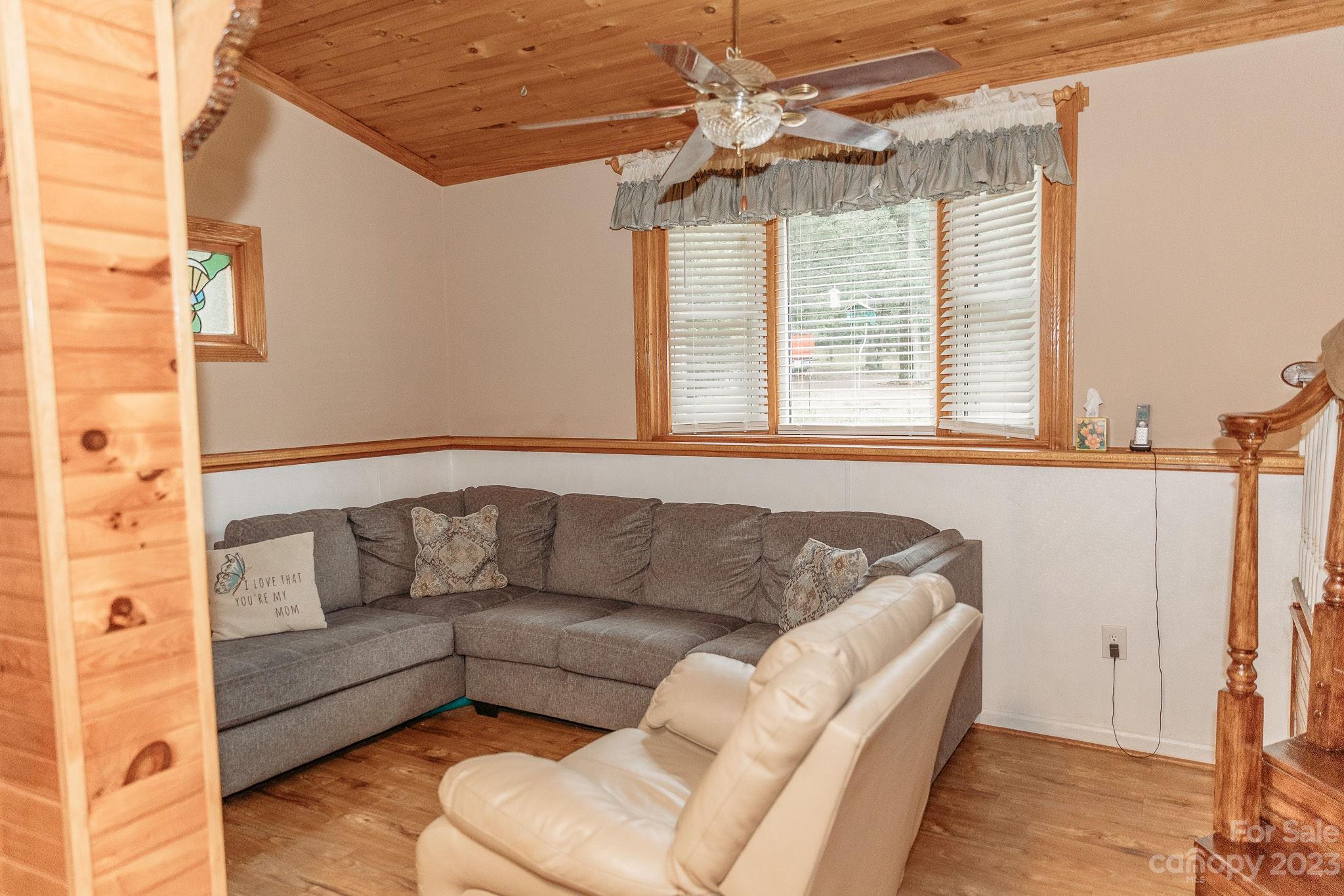 8808 Webb Road Stanfield, NC 28163 - Photo 5 of 33 a living room with furniture and a window