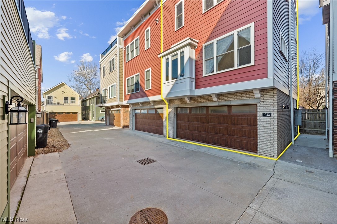 View of front of property featuring a garage