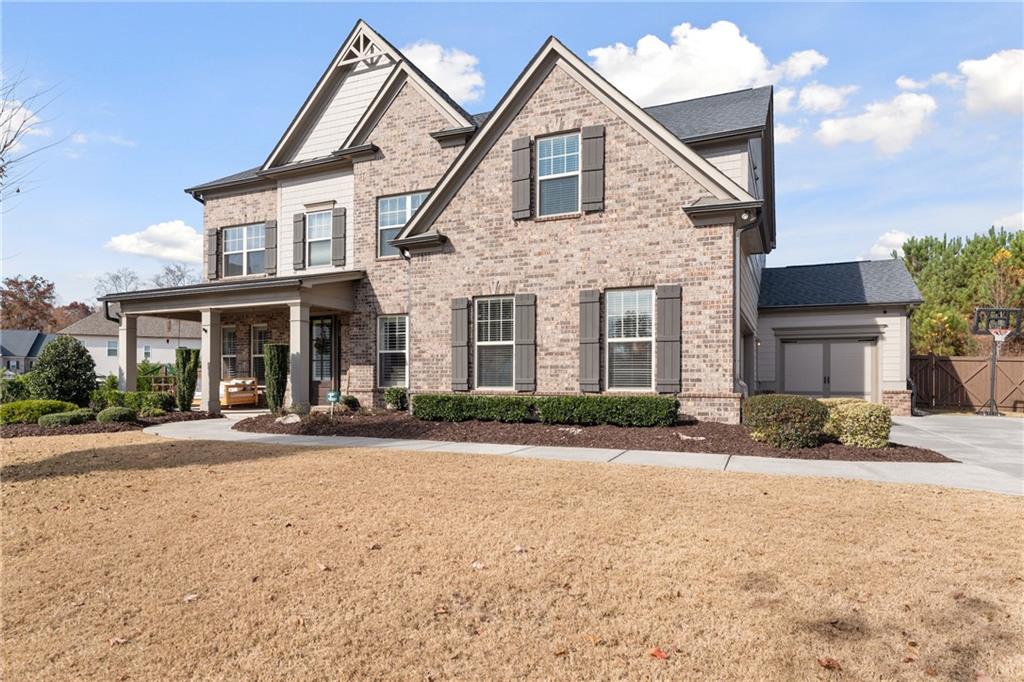 3630 Valleyway Road Cumming, GA 30040 - Photo 1 of 1 Craftsman inspired home featuring a garage and a porch