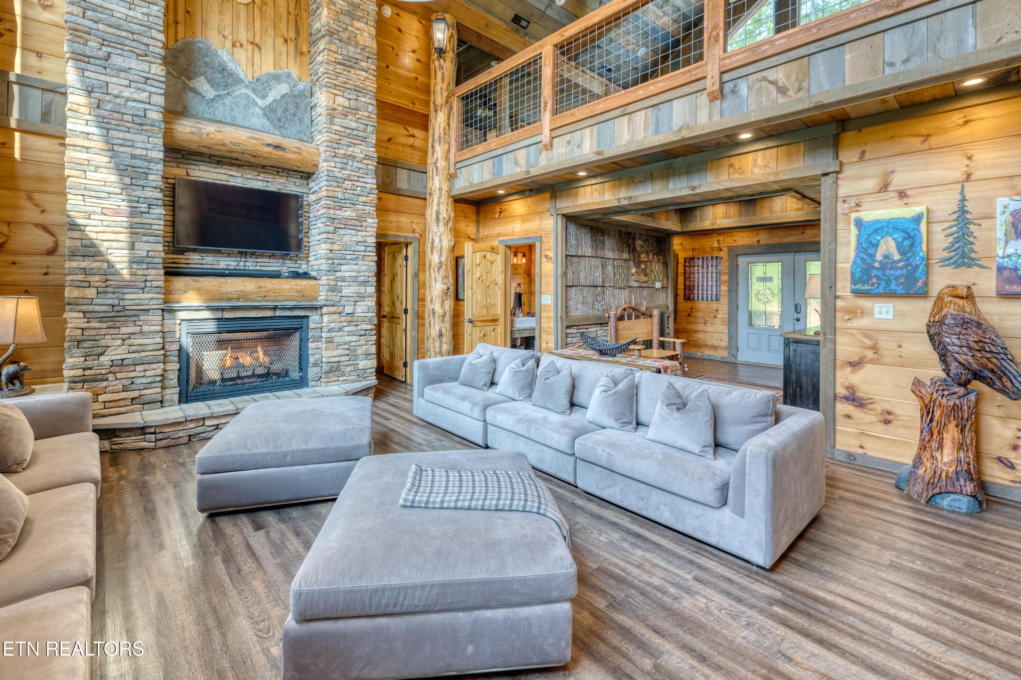 809 Pinecrest Way Sevierville, TN 37862 - Photo 5 of 60 a living room with furniture and a fireplace