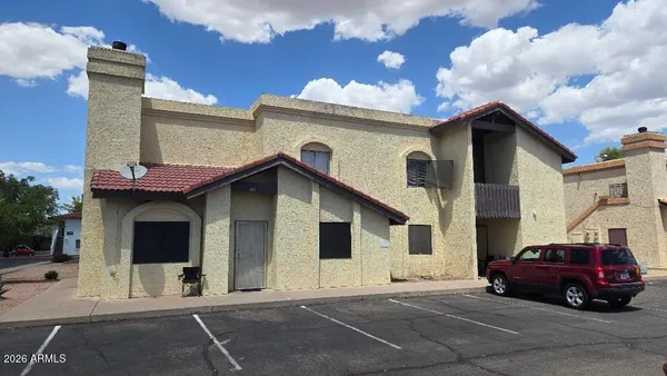 a car parked in front of a house