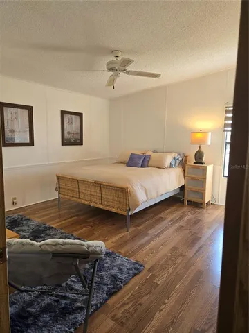 a view of a bedroom from the hallway