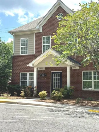 front view of a house and a yard