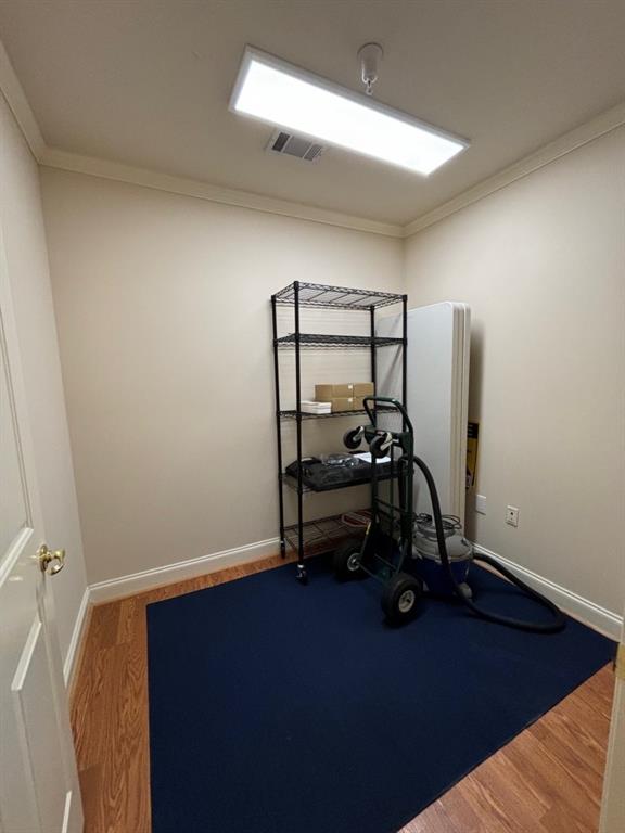 122 Prospect Place Alpharetta, GA 30005 - Photo 6 of 9 a view of a room with gym equipment
