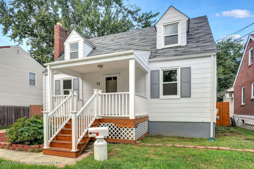 71 Ravine Drive Matawan, NJ 07747 - Photo 1 of 22 a front view of a house with a yard