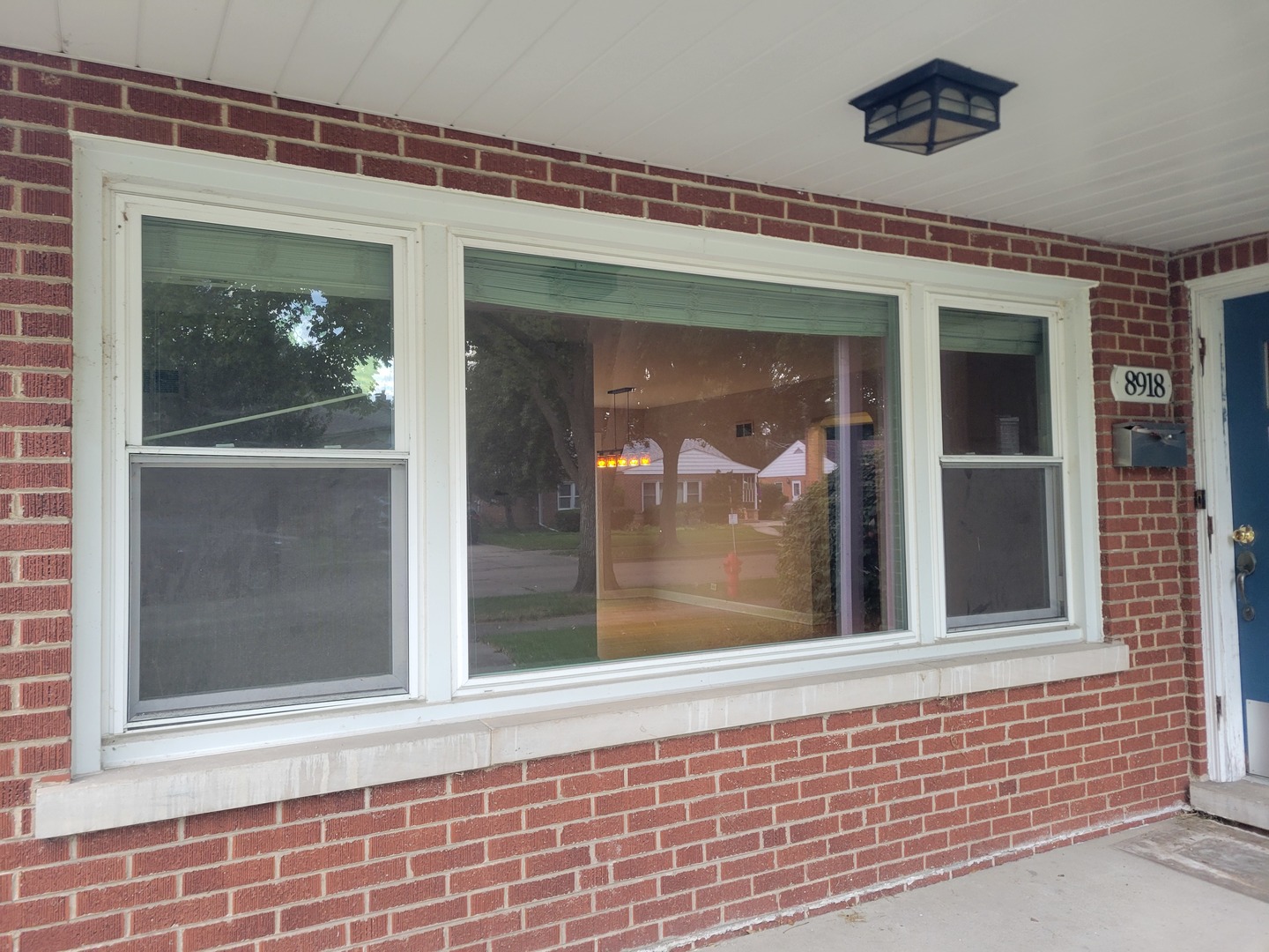 8918 Parkside Avenue Morton Grove, IL 60053 - Photo 11 of 36 front view of a house with a window