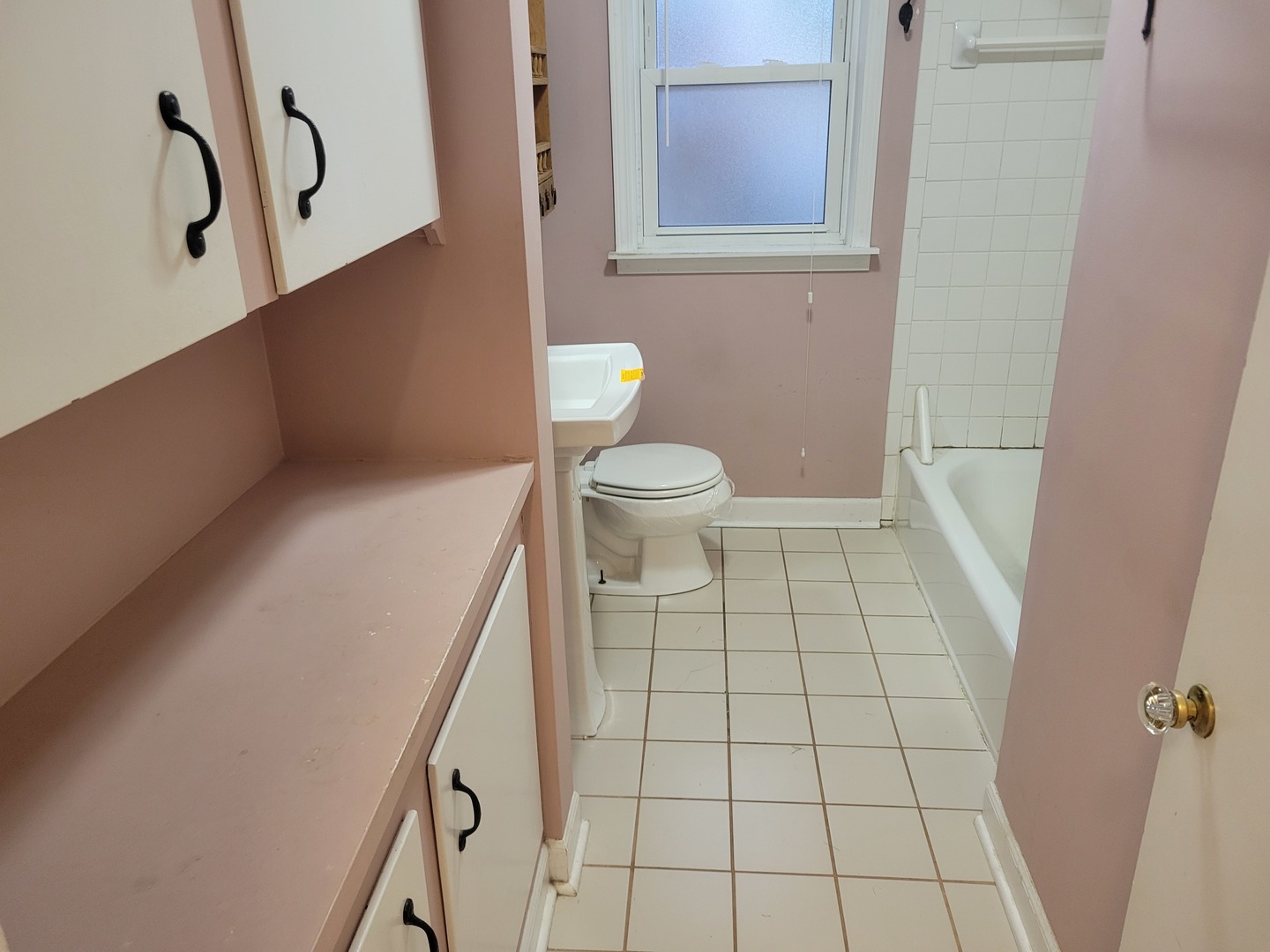 8918 Parkside Avenue Morton Grove, IL 60053 - Photo 24 of 36 a bathroom with a toilet and a mirror