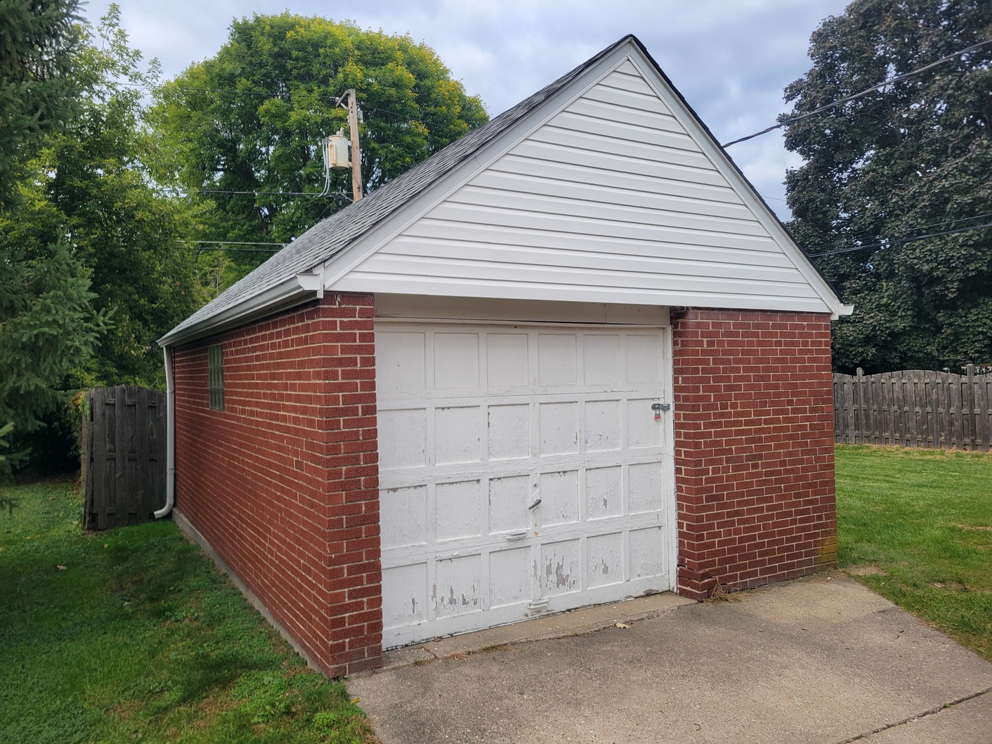 8918 Parkside Avenue Morton Grove, IL 60053 - Photo 6 of 36 a view of a small house and garage