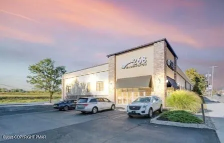 a view of car parked in front of building