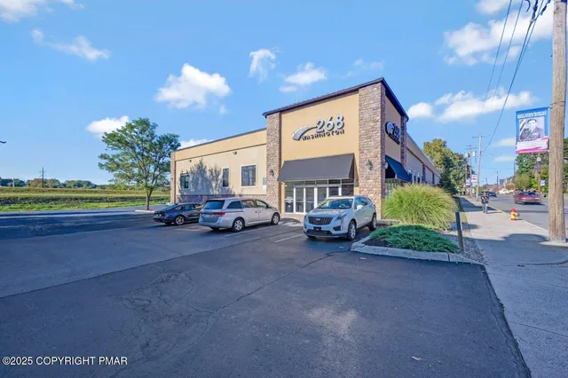 a view of a car park in front of a building