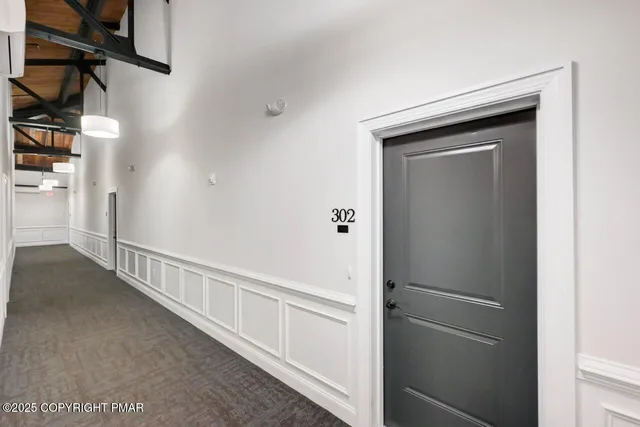 a view of hallway with closet