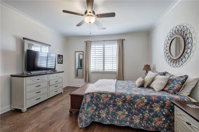 a view of walk in closet with clothes