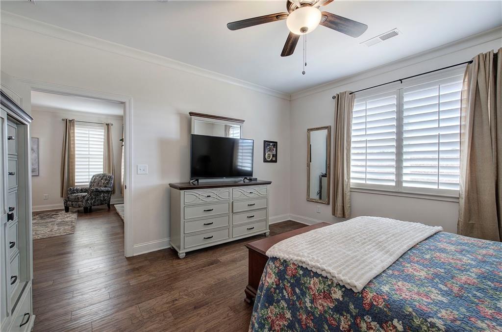 6 Encore Lane Cartersville, GA 30120 - Photo 15 of 33 a bedroom with a bed and a flat screen tv