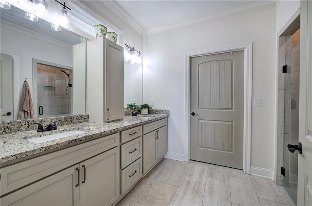 6 Encore Lane Cartersville, GA 30120 - Photo 16 of 33 a bathroom with a granite countertop double vanity sink and mirror