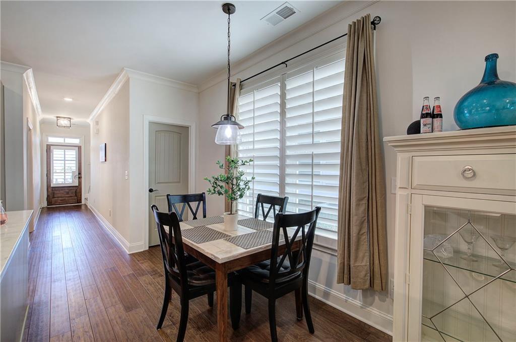 6 Encore Lane Cartersville, GA 30120 - Photo 4 of 33 a view of a dining room with furniture window and wooden floor