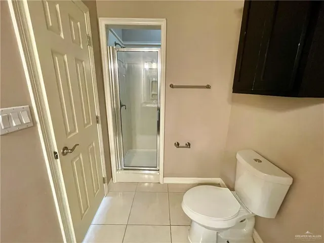 a bathroom with a toilet and a sink