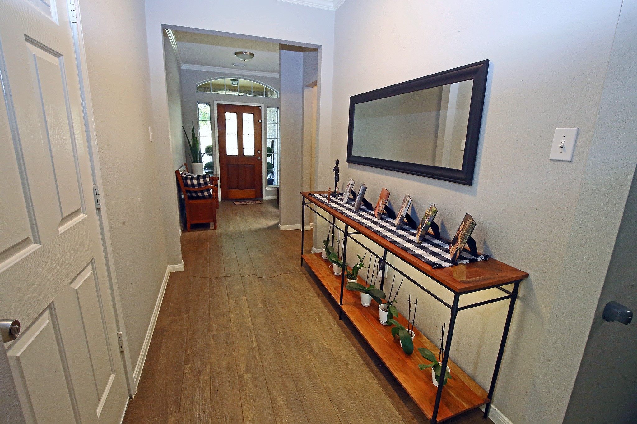 907 Riverside Drive Alvin, TX 77511 - Photo 12 of 31 Let's go down the hallway to the secondary bedrooms.