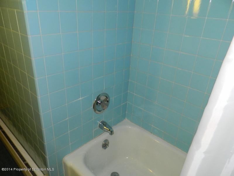 233 East Mountain Road Scranton, PA 18505 - Photo 12 of 26 a bathroom with a sink and shower