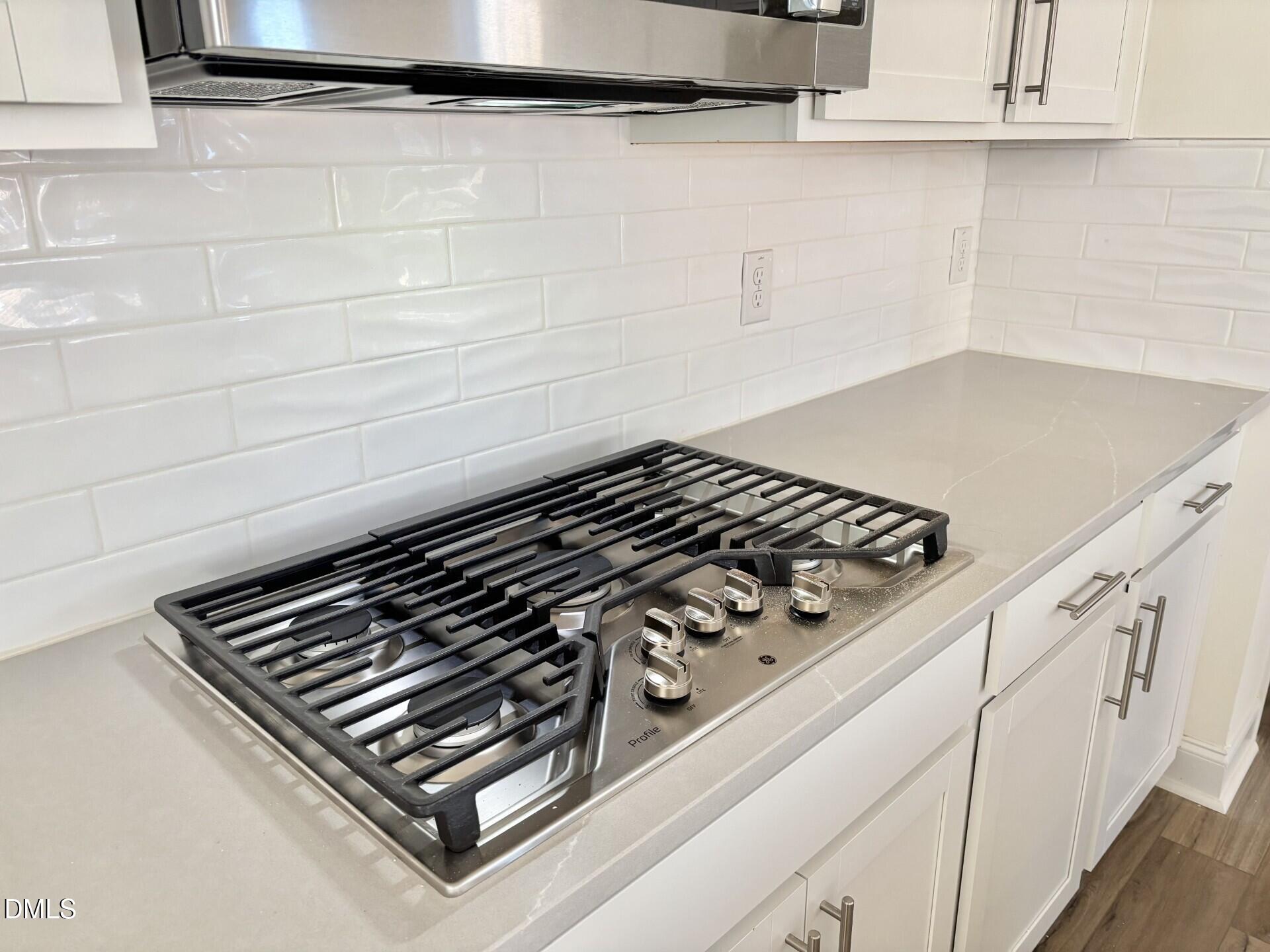 20 Gerrard Street, Unit 6 Franklinton, NC 27525 - Photo 12 of 31 a close up of a stove top oven sitting inside of a kitchen