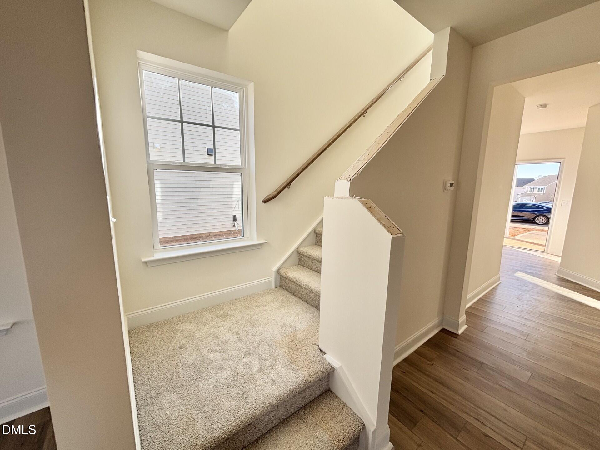 20 Gerrard Street, Unit 6 Franklinton, NC 27525 - Photo 15 of 31 a view of entryway and hall with wooden floor