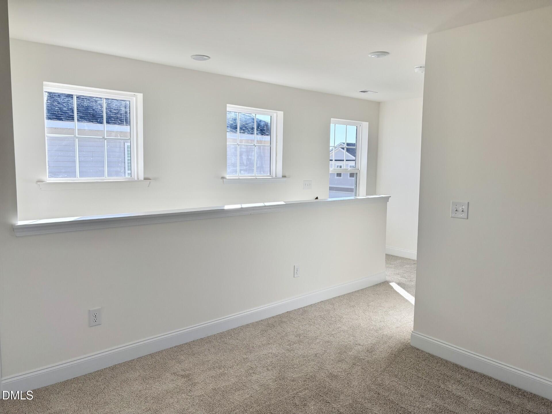 20 Gerrard Street, Unit 6 Franklinton, NC 27525 - Photo 18 of 31 an empty room with windows