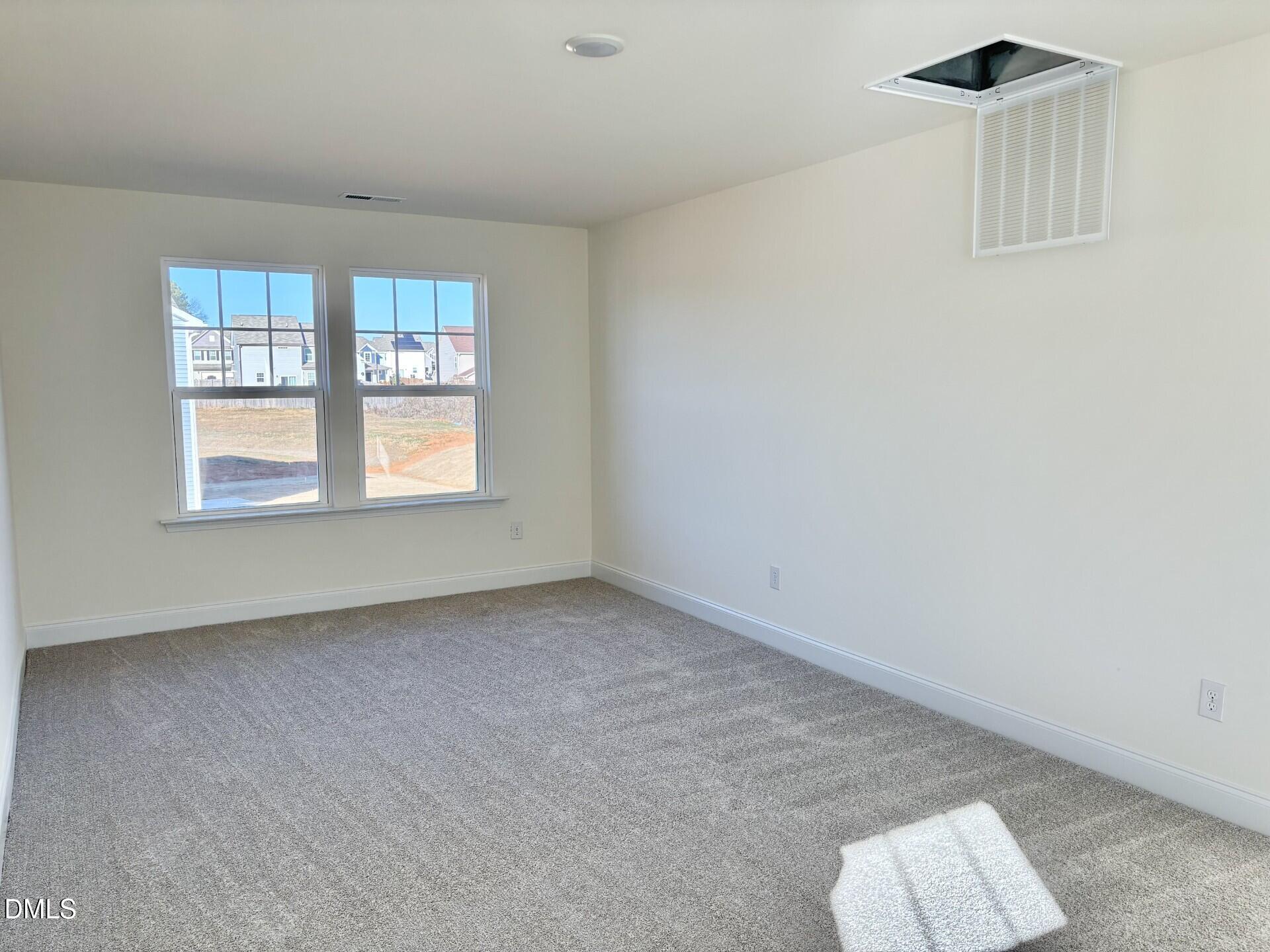 20 Gerrard Street, Unit 6 Franklinton, NC 27525 - Photo 19 of 31 an empty room with windows