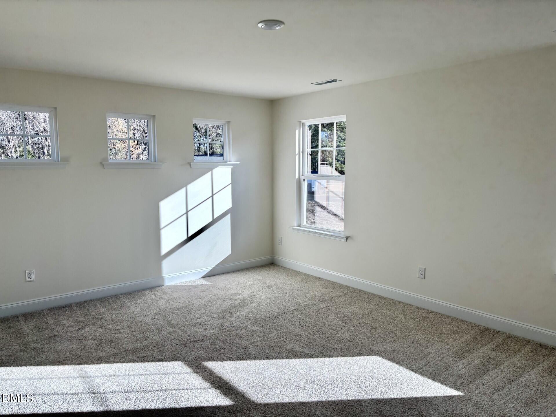 20 Gerrard Street, Unit 6 Franklinton, NC 27525 - Photo 25 of 31 an empty room with windows